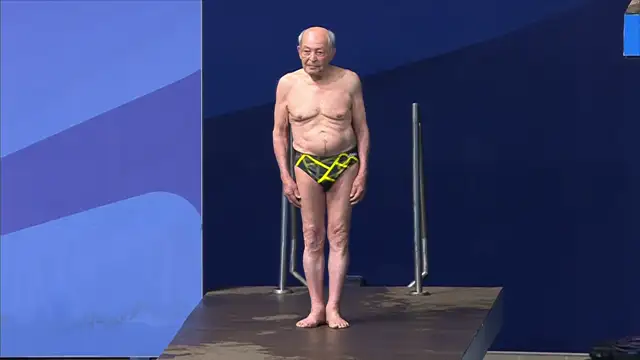 100-year-old Iranian Taghi Asgari performs a 1m dive at the 2024 World Aquatics in Doha